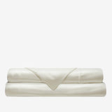 Capri Cream sateen folded sheets