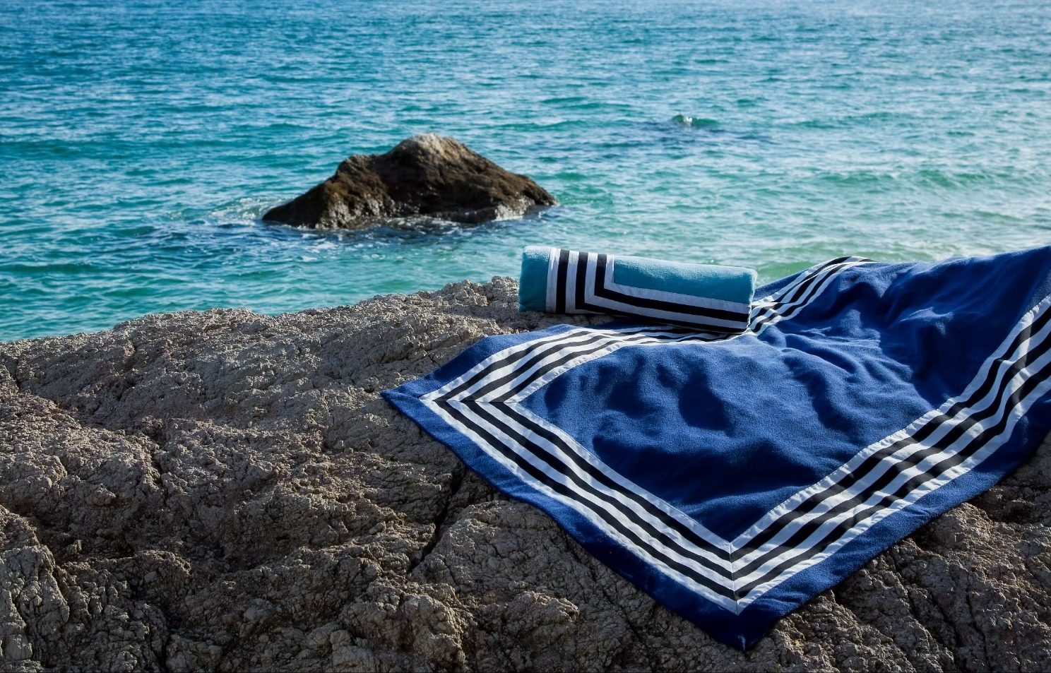 Abyss & Habidecor beach towels by the sea